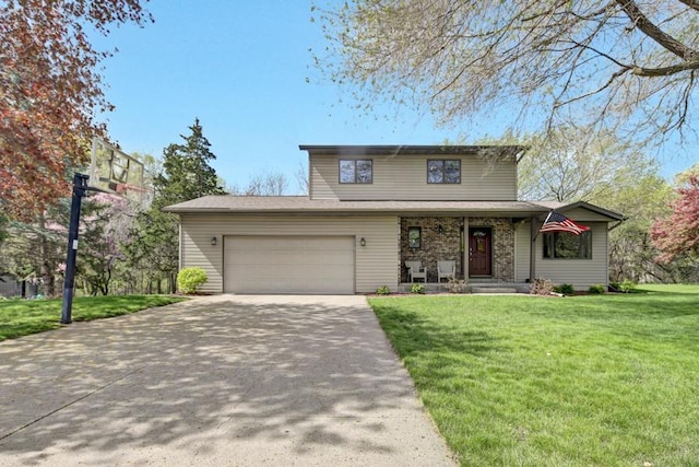 traditional-style home with a garage, concrete driveway, and a front lawn