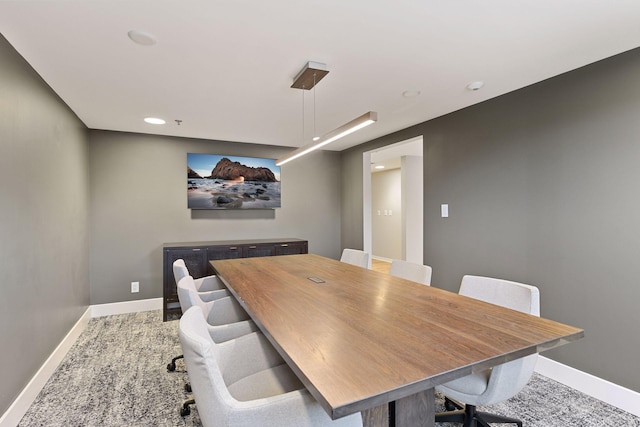 dining room featuring carpet flooring