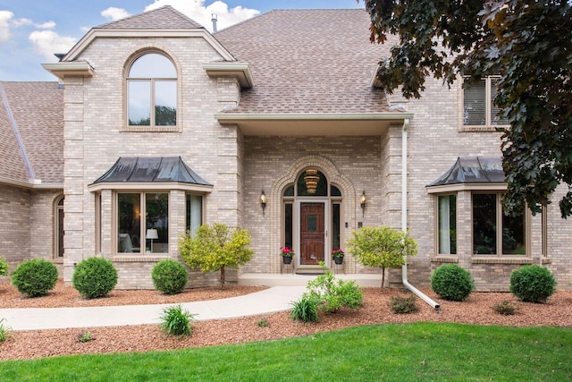 11824 Welters Way, Eden Prairie, MN 55347 - view of front of home featuring brick siding and roof with shingles