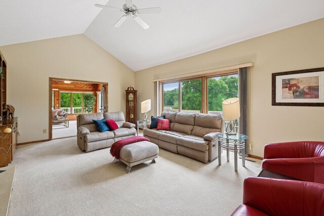 11824 Welters Way, Eden Prairie, MN 55347 - living area featuring light carpet, plenty of natural light, a ceiling fan, high vaulted ceiling, and baseboards