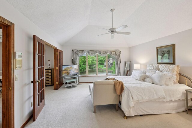11824 Welters Way, Eden Prairie, MN 55347 - bedroom featuring french doors, vaulted ceiling, carpet flooring, a ceiling fan, and a textured ceiling