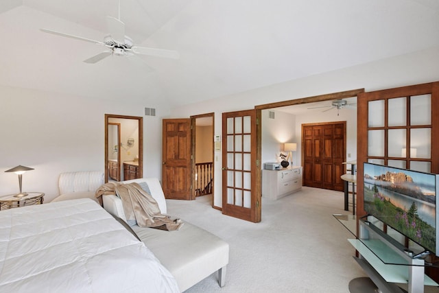 11824 Welters Way, Eden Prairie, MN 55347 - bedroom with french doors, light colored carpet, vaulted ceiling, ensuite bathroom, and ceiling fan