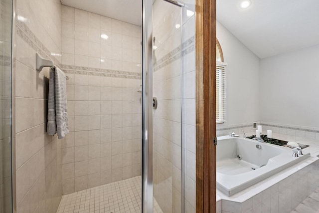 11824 Welters Way, Eden Prairie, MN 55347 - bathroom featuring a shower stall, a bath, and recessed lighting