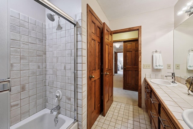 11824 Welters Way, Eden Prairie, MN 55347 - bathroom featuring double vanity, tile patterned flooring, and tub / shower combination