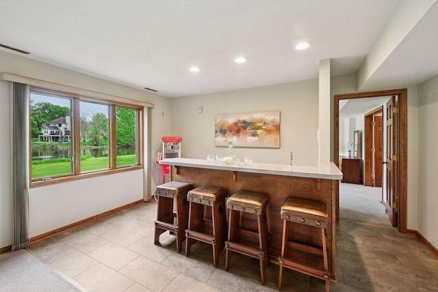11824 Welters Way, Eden Prairie, MN 55347 - indoor bar featuring baseboards and recessed lighting
