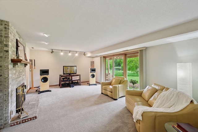 11824 Welters Way, Eden Prairie, MN 55347 - living room featuring light carpet, rail lighting, a brick fireplace, and a textured ceiling