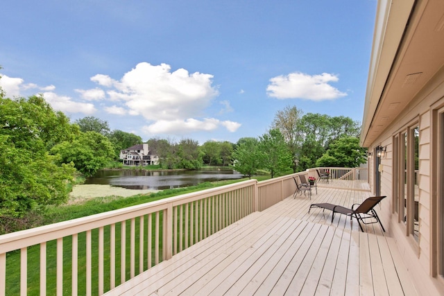 11824 Welters Way, Eden Prairie, MN 55347 - wooden terrace with a water view, view of wooded area, and a yard