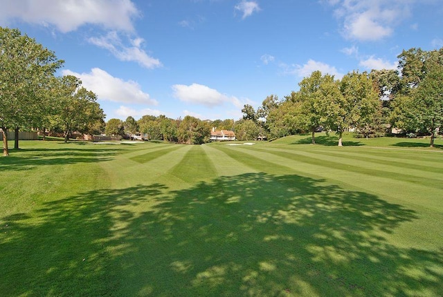 11824 Welters Way, Eden Prairie, MN 55347 - surrounding community featuring golf course view, view of scattered trees, and a lawn