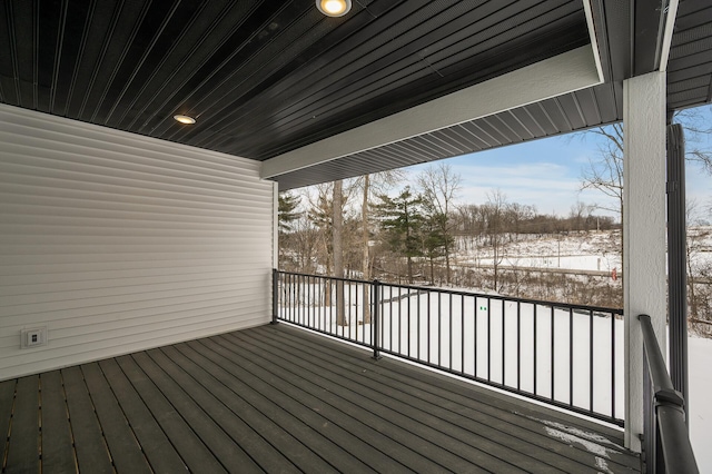 view of snow covered deck