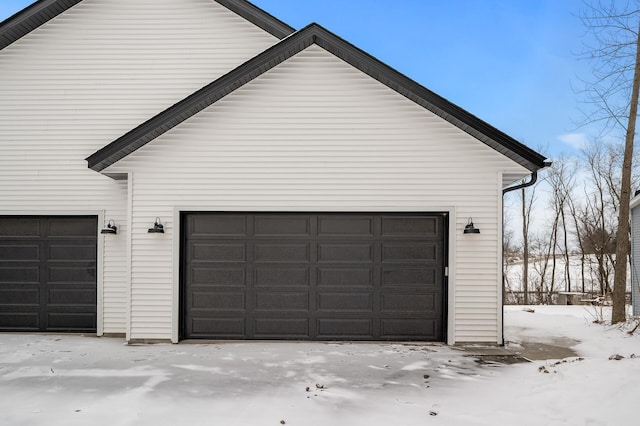 view of snow covered garage