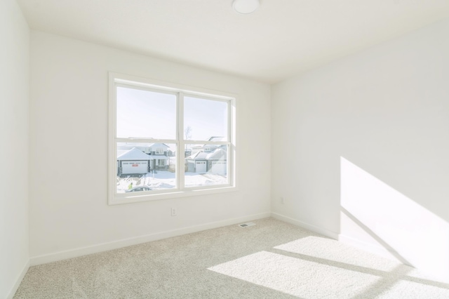 empty room with light carpet