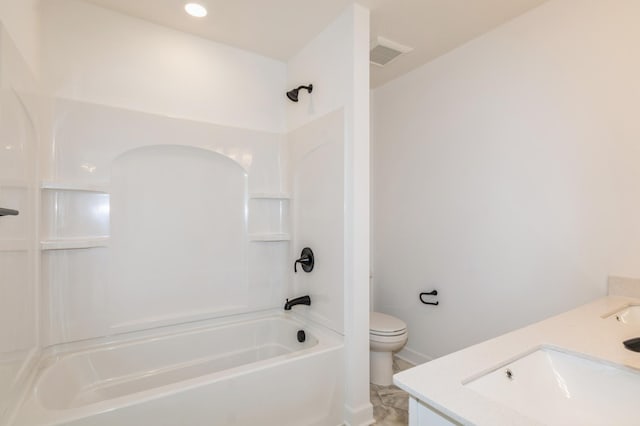 full bathroom with bathtub / shower combination, vanity, and toilet