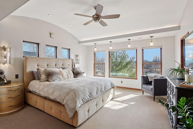 bedroom featuring light carpet, baseboards, vaulted ceiling, and a ceiling fan