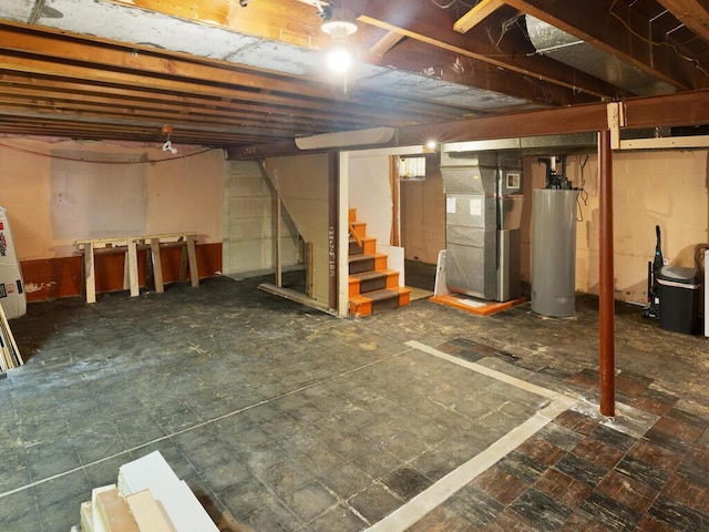 basement with gas water heater and heating unit