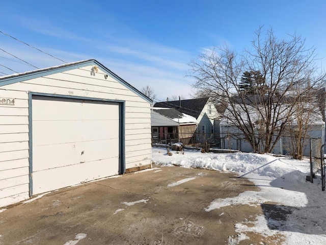 view of snow covered garage