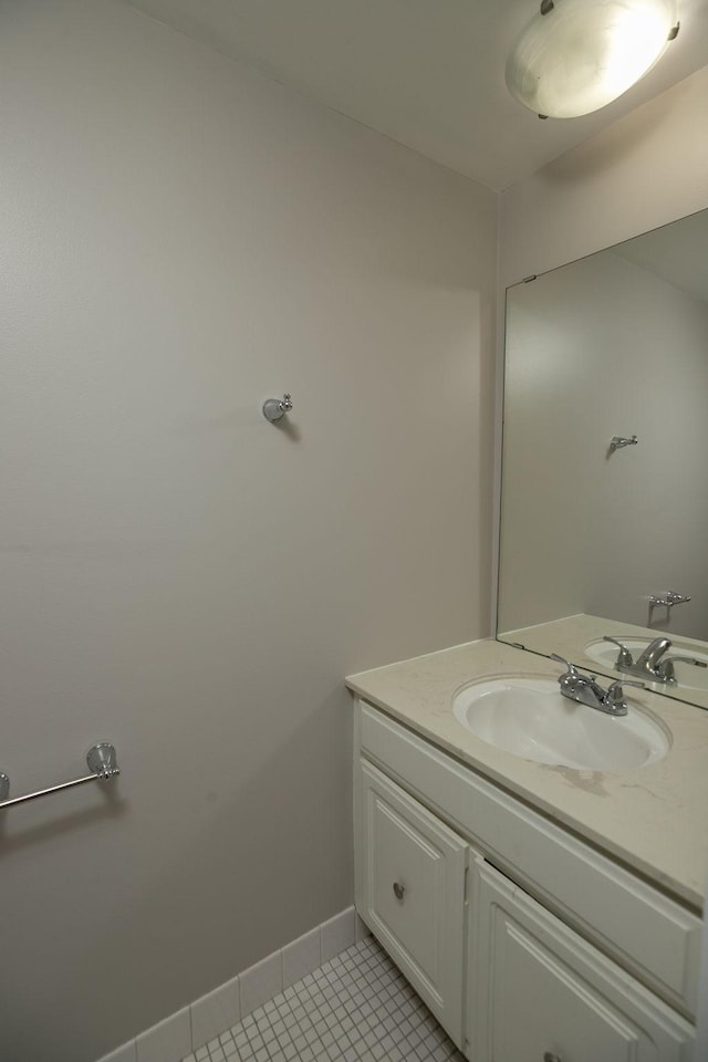 bathroom with vanity and tile patterned flooring