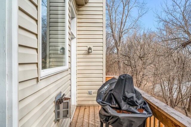 wooden deck with area for grilling