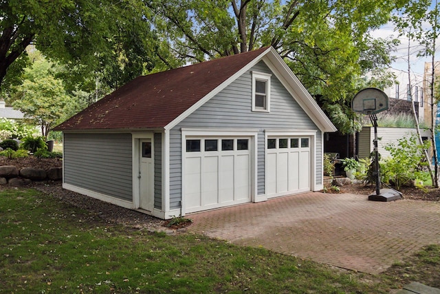 garage featuring a yard