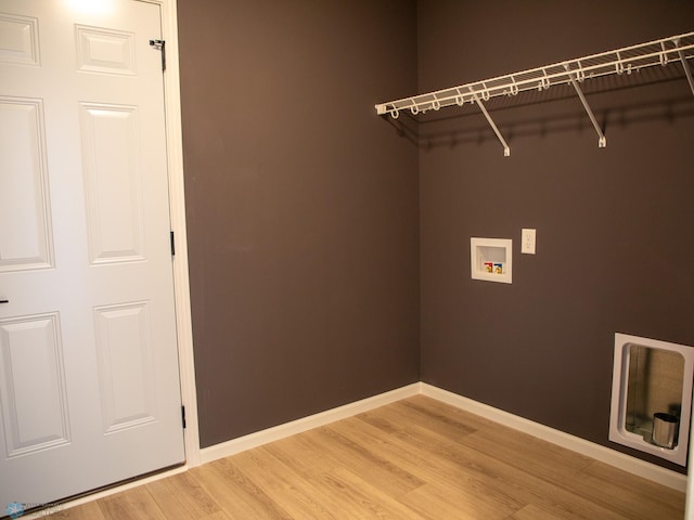 laundry room featuring washer hookup and wood-type flooring