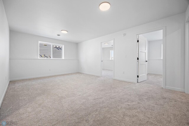 69 Cedar Dr, Mapleton, ND 58059 - empty room featuring carpet floors, baseboards, and plenty of natural light