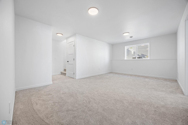 69 Cedar Dr, Mapleton, ND 58059 - unfurnished room with light carpet and baseboards