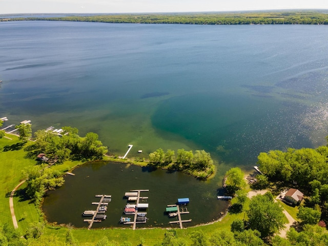 birds eye view of property featuring a water view