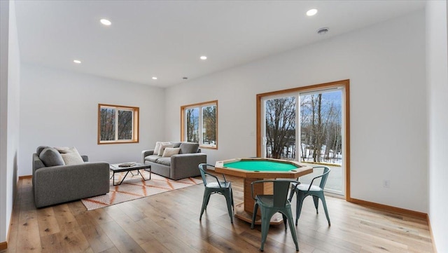 playroom with light wood-style floors, recessed lighting, and baseboards