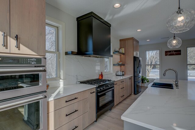 880 Norell Ave N, West Lakeland Twp, MN 55082 - kitchen featuring black appliances, a sink, extractor fan, modern cabinets, and light brown cabinets