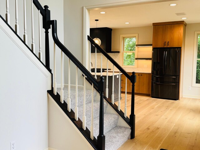 880 Norell Ave N, West Lakeland Twp, MN 55082 - stairway with wood finished floors, baseboards, and recessed lighting