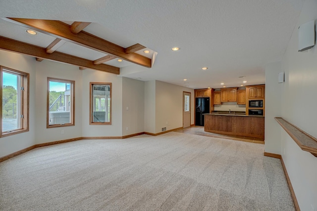 880 Norell Ave N, West Lakeland Twp, MN 55082 - unfurnished living room featuring light carpet, baseboards, recessed lighting, and beamed ceiling