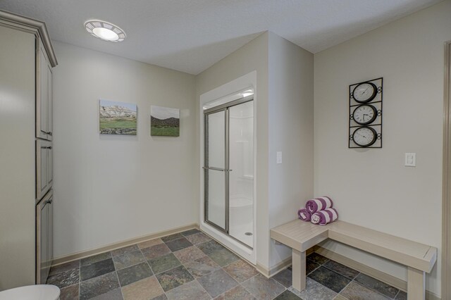 880 Norell Ave N, West Lakeland Twp, MN 55082 - mudroom with dark stone finish flooring and baseboards