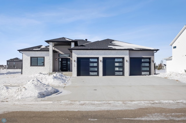 view of front of house with a garage and driveway