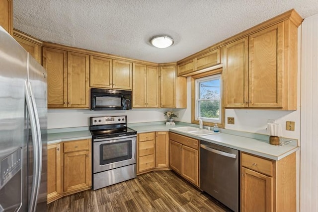 4345 Upper 145th St W, Rosemount, MN 55068 - kitchen featuring stainless steel appliances, dark wood-type flooring, a textured ceiling, and light countertops