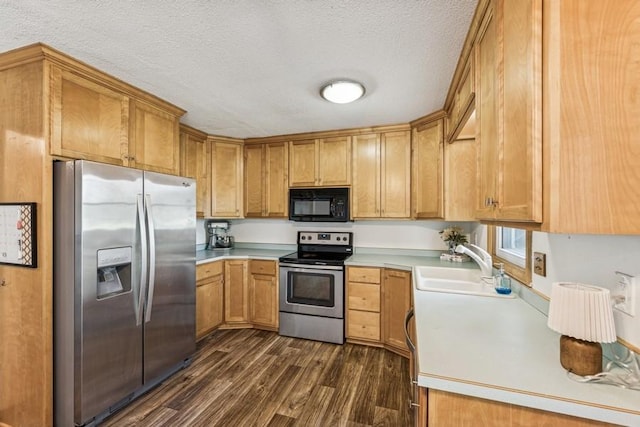 4345 Upper 145th St W, Rosemount, MN 55068 - kitchen with appliances with stainless steel finishes, dark wood-style flooring, light countertops, and a textured ceiling