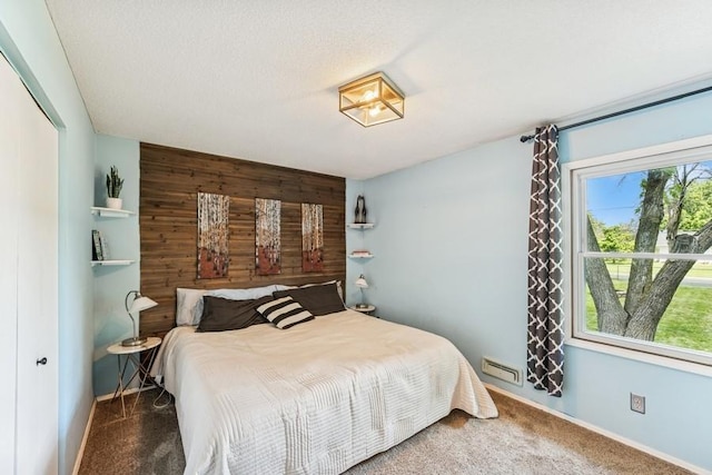 4345 Upper 145th St W, Rosemount, MN 55068 - carpeted bedroom featuring wood walls and an accent wall