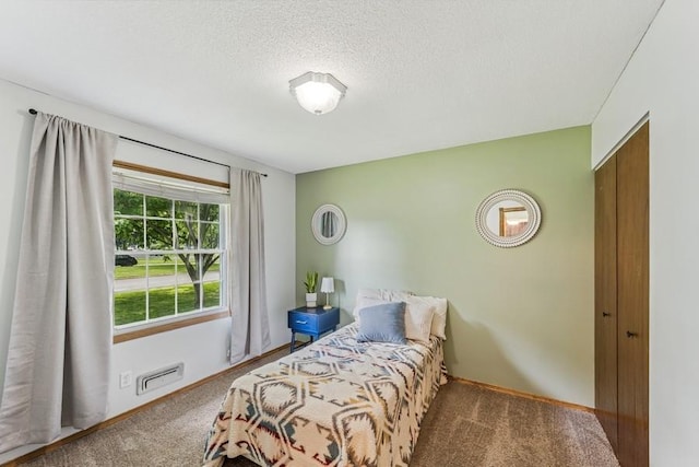 4345 Upper 145th St W, Rosemount, MN 55068 - carpeted bedroom featuring a textured ceiling and baseboards