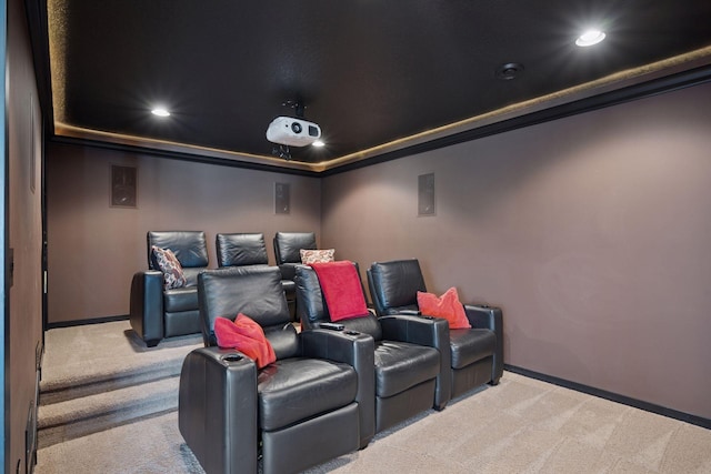 carpeted home theater featuring baseboards, recessed lighting, and a tray ceiling