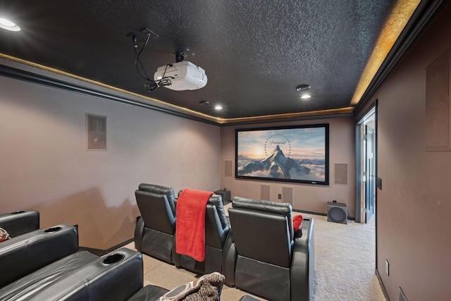 carpeted home theater room with baseboards, recessed lighting, a textured ceiling, and ornamental molding