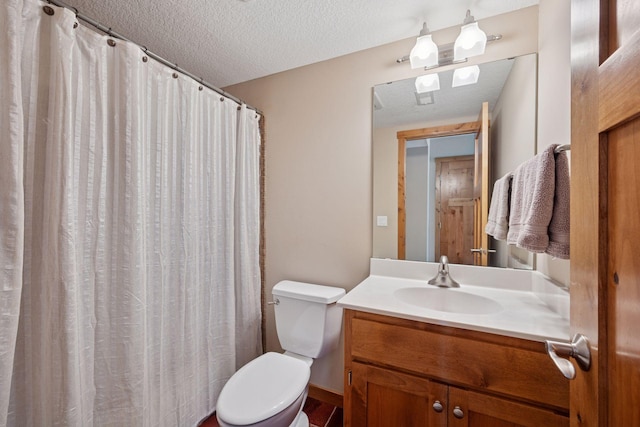 full bath featuring vanity, a textured ceiling, toilet, and a shower with curtain