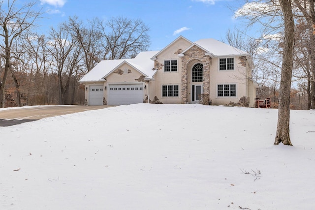 view of front of property with a garage