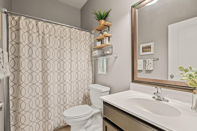 bathroom with toilet, a textured ceiling, vanity, and a shower with shower curtain