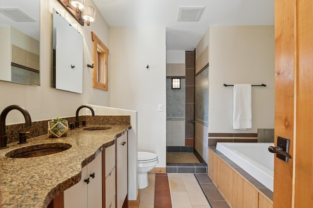 full bathroom with toilet, visible vents, and a sink