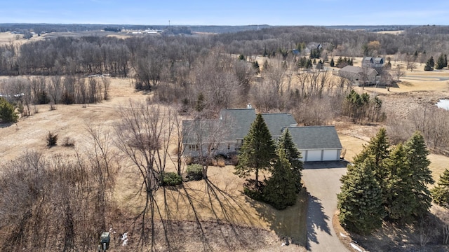 bird's eye view featuring a view of trees