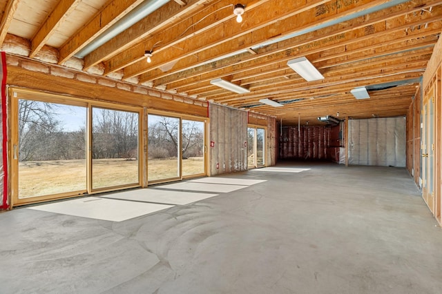 misc room with concrete flooring