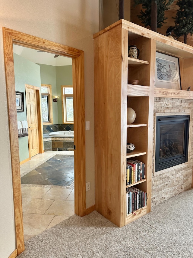 hallway featuring carpet flooring