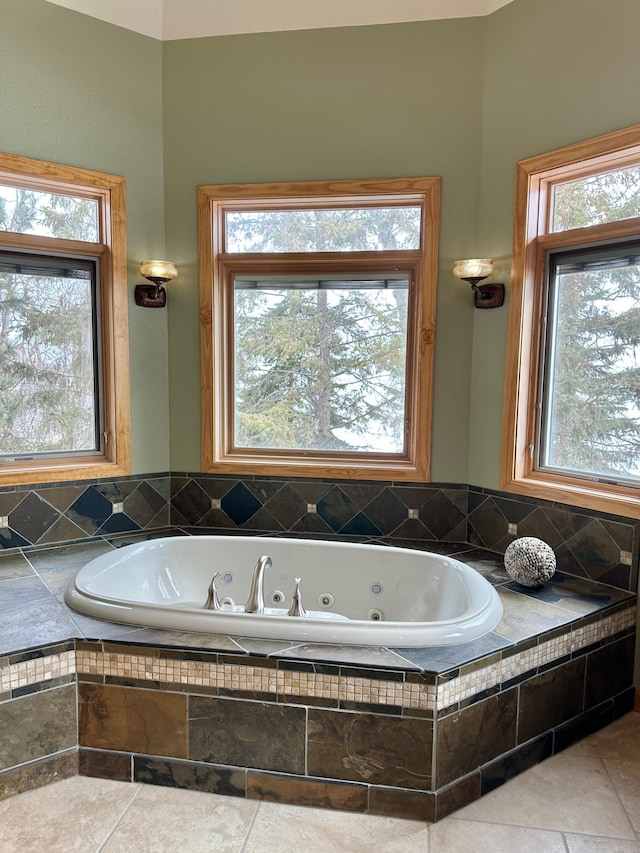 full bathroom featuring a whirlpool tub