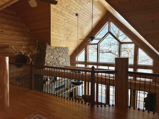 additional living space featuring wooden ceiling, wood finished floors, and ceiling fan