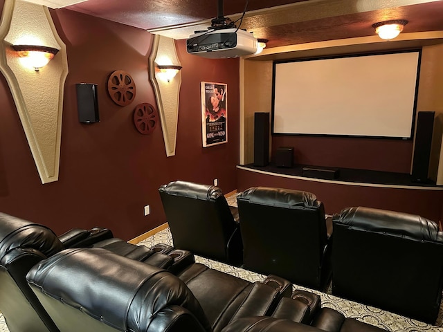 home theater room featuring baseboards