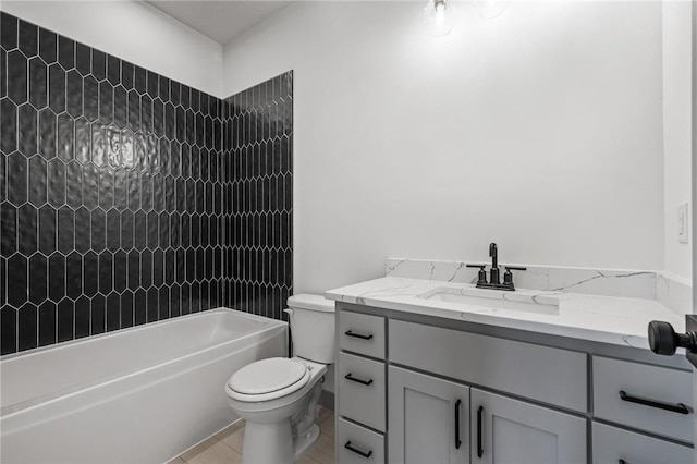 full bathroom with tiled shower / bath combo, vanity, tile patterned flooring, and toilet