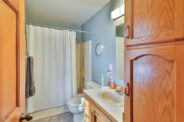 full bathroom featuring toilet, vanity, and shower / bathtub combination with curtain